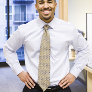 a-portrait-of-a-black-businessman-standing-alone-i-2023-11-27-04-58-26-utc